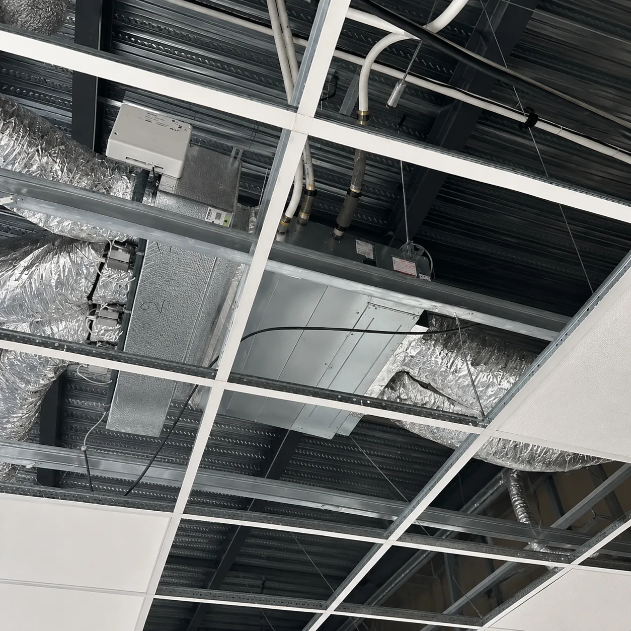 Unité de climatisation gainable en faux-plafond à Brignais